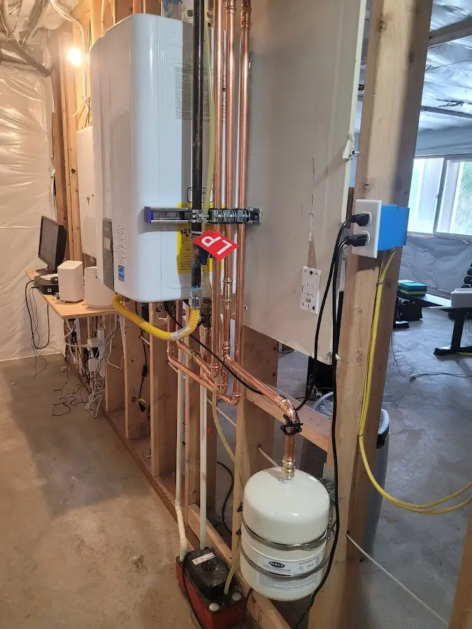 Licensed plumber repairing a kitchen sink in Walnut Ridge
